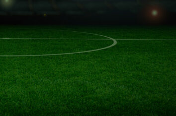 Green Soccer Field Free PPT Background by SlidesCorner