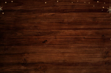 Christmas Snowflakes & Mistletoes on Wood Free PPT Background by SlidesCorner.com