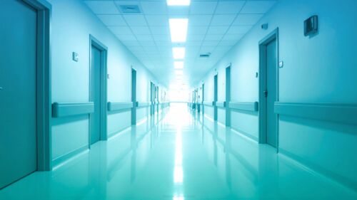 Medical PPT Background Hospital Rooms by SlidesCorner.com