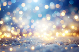 Winter Background with Snow and Twinkling Golden Lights