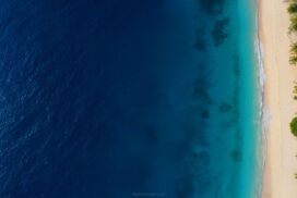 Water Background for Slides with Blue Ocean and Beach – Free HD Presentation Background