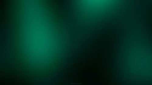 Dark Green Background For PowerPoint With An Emerald Glow Dark Green Background For PowerPoint With An Emerald Glow