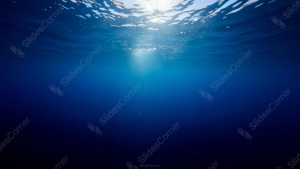 Blue Background With Underwater Sunrays Breaking The Surface