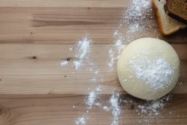 Baking Background For PowerPoint With A Flour-Dusted Dough Ball