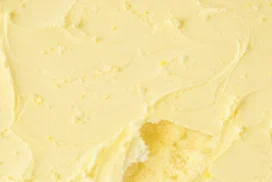 Cream Butter Texture Background For PowerPoint With Cake Crumbs