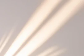 Beige Background For PowerPoint With Soft Diagonal Sunlight Beams