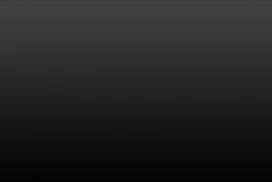 Black Gradient Background for PowerPoint with a Charcoal Grey Glow Fading to Deep Black