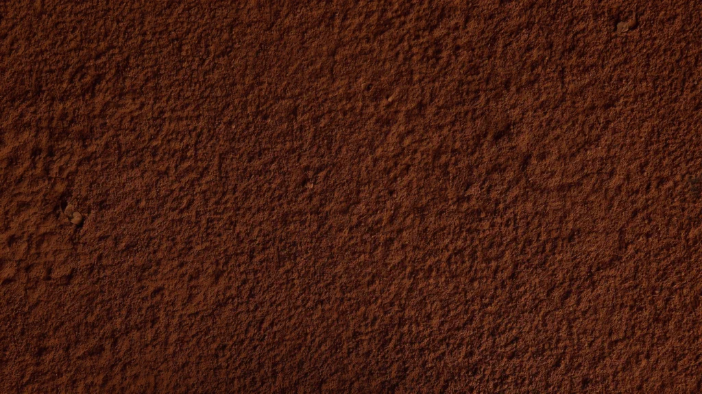 Brown Ground Coffee Texture Background for PowerPoint with Coarse Dark Roast Granules