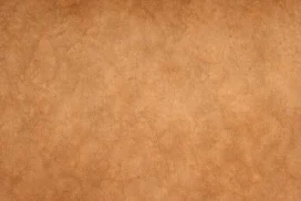 Brown Paper Background for PowerPoint with a Caramel Kraft Tone and Faint Mottled Fibers