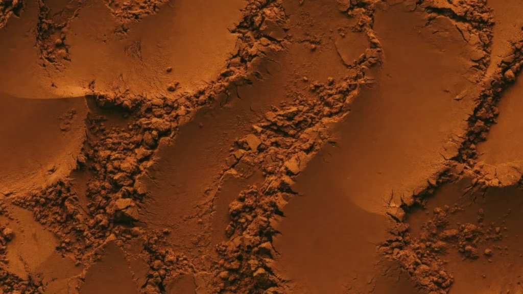 Cocoa Powder Texture Background for PowerPoint with Rust Brown Ridges and Crumbs