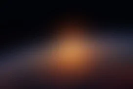 Dark Bokeh Background for Google Slides with a Blurred Amber Glow