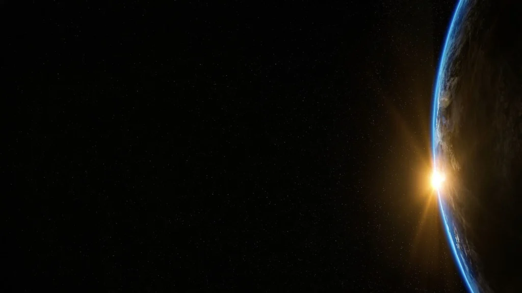Earth Space Background for PowerPoint with a Golden Sunrise Horizon