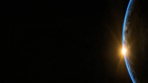 Earth Space Background for PowerPoint with a Golden Sunrise Horizon