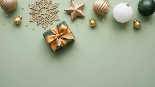 Green Christmas Flat Lay Background for PowerPoint with Gold Gift Bow and Sage Backdrop