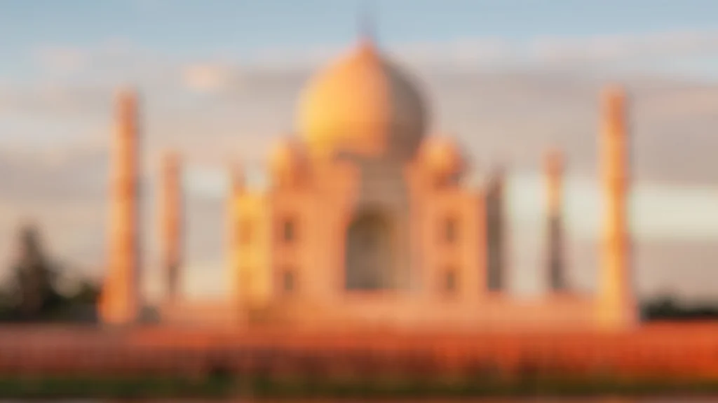 Taj Mahal Background For PowerPoint With A Blurred Marble Dome In Peach Sunset Light