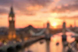London Background for PowerPoint with Blurred Big Ben, Tower Bridge and Thames Sunset