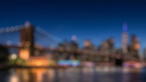 City Skyline Background for PowerPoint with Blurred Bridge Lights at Night