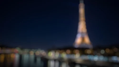 Paris Eiffel Tower Night Background for PowerPoint with Blurred Golden City Lights Paris Eiffel Tower Night Background for PowerPoint with Blurred Golden City Lights