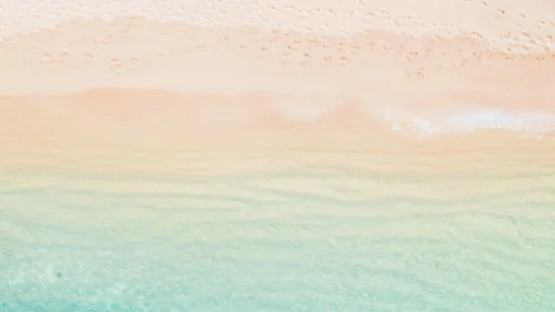 Pastel Beach Background for Google Slides with Aerial Shoreline Pastel Beach Background for Google Slides with Aerial Shoreline