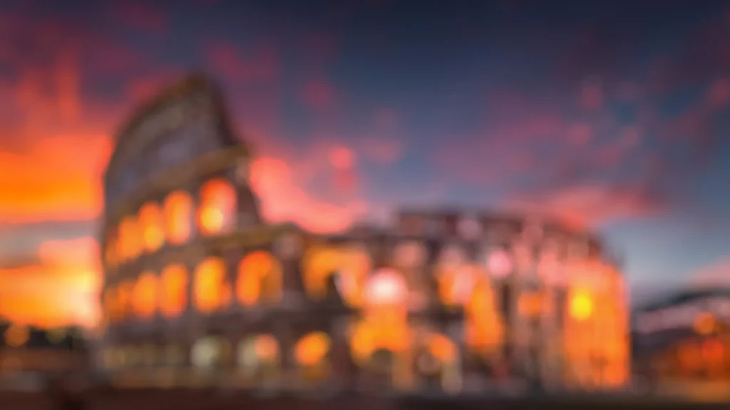 Colosseum Background for PowerPoint with Blurred Orange Sunset Sky over Rome