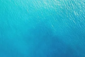 Ocean Water Background For PowerPoint With An Aerial Turquoise View